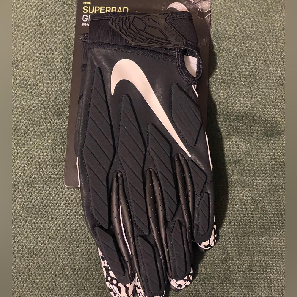 Nike SuperBad Football Gloves. Brand new and runs in a size XL.
